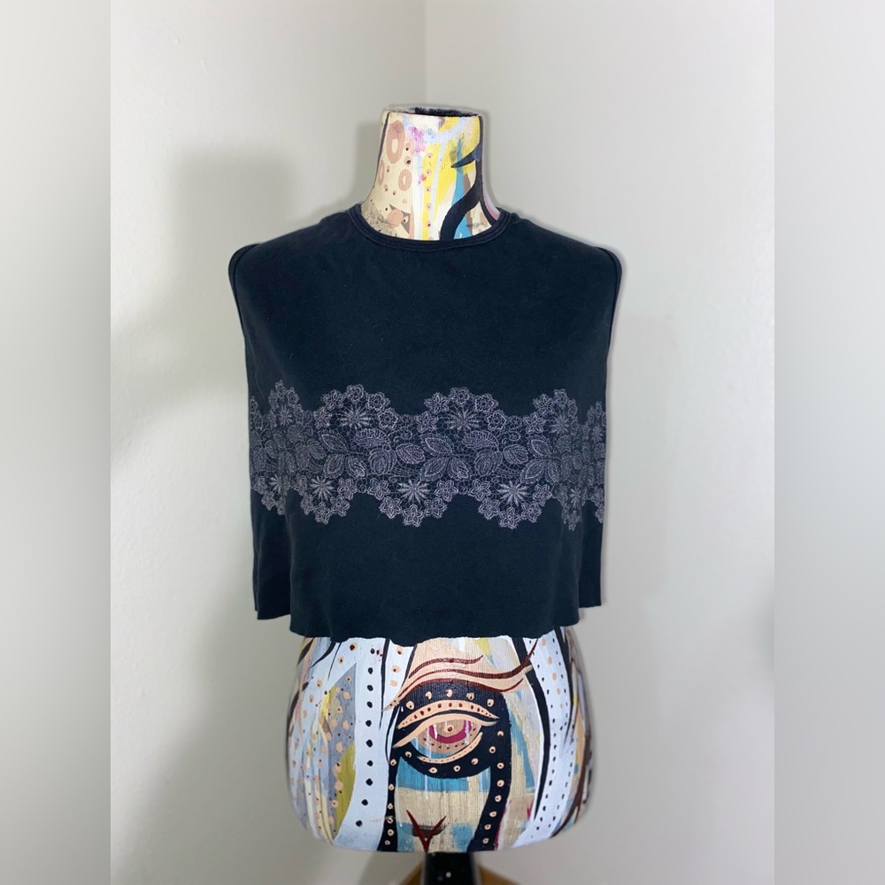 Grunge floral crop top/tank. 
Size: S. Reworked/up cycled. Raw cut bottom hem.